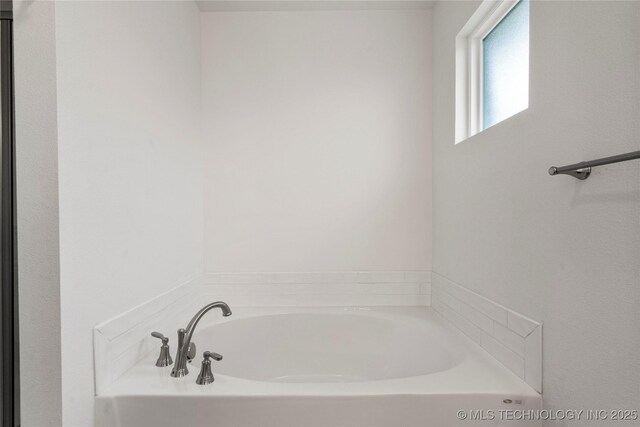 10812 S 274th Ave E, Coweta, OK 74014 - bathroom with a bath