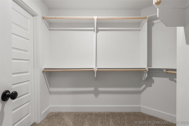 10812 S 274th Ave E, Coweta, OK 74014 - spacious closet featuring carpet floors