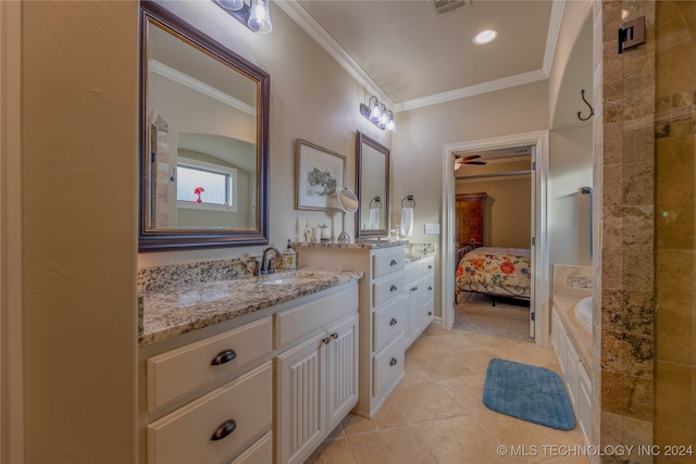 bathroom featuring a bathtub, ceiling fan, tile patterned floors, ornamental molding, and vanity