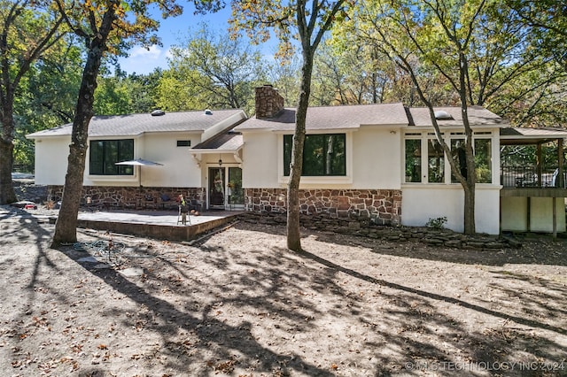 view of front of house with a patio