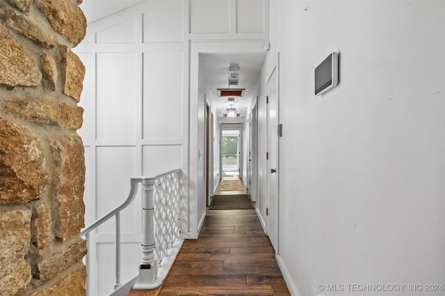 hallway featuring dark wood-type flooring