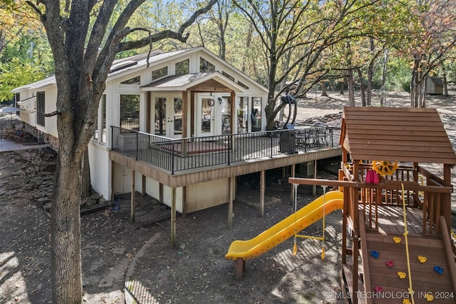 view of jungle gym featuring a deck