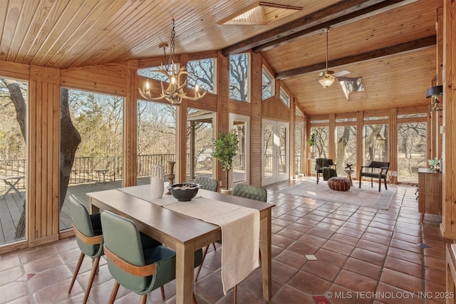 sunroom featuring lofted ceiling with beams, a chandelier, and wood ceiling