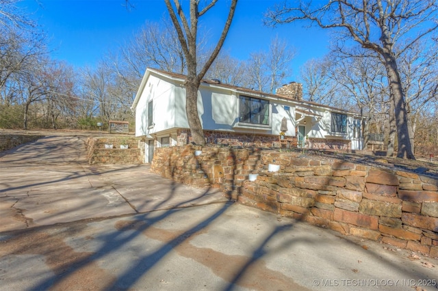 view of front of property with a chimney