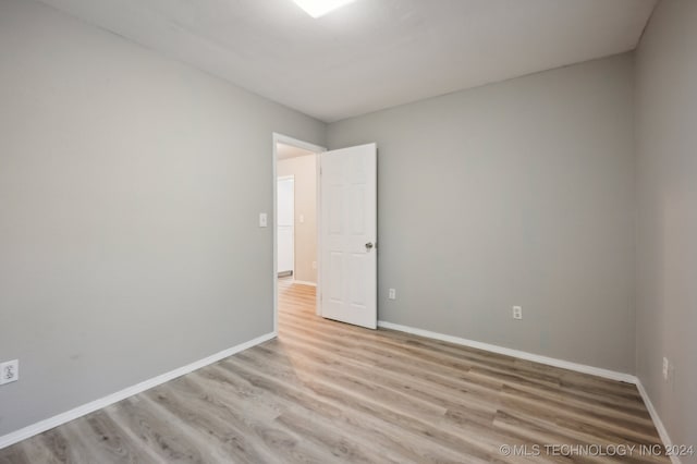 empty room featuring light hardwood / wood-style flooring