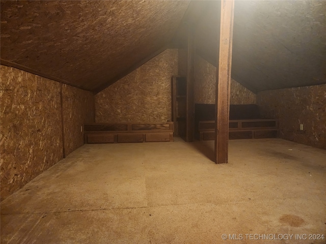 bonus room featuring vaulted ceiling