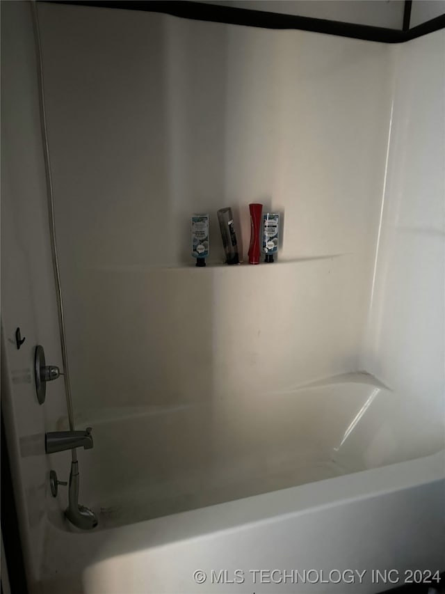 bathroom with shower / bathtub combination