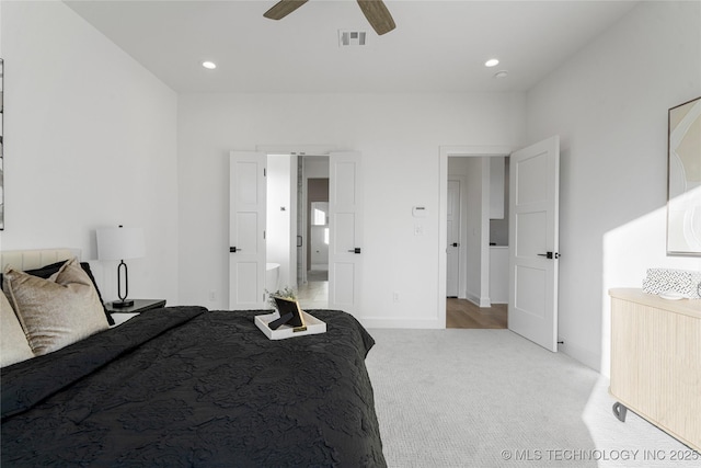 carpeted bedroom with ceiling fan