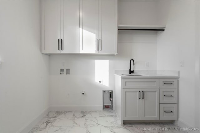 laundry room with cabinets, washer hookup, electric dryer hookup, sink, and hookup for a gas dryer