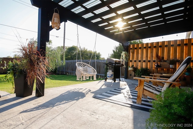 view of patio with a pergola and a grill