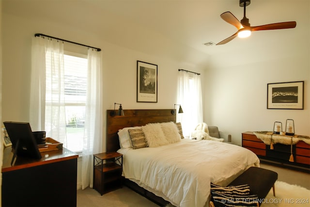 bedroom featuring ceiling fan and light colored carpet