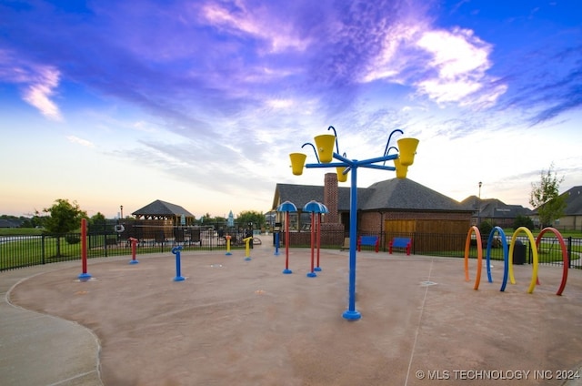 view of playground at dusk