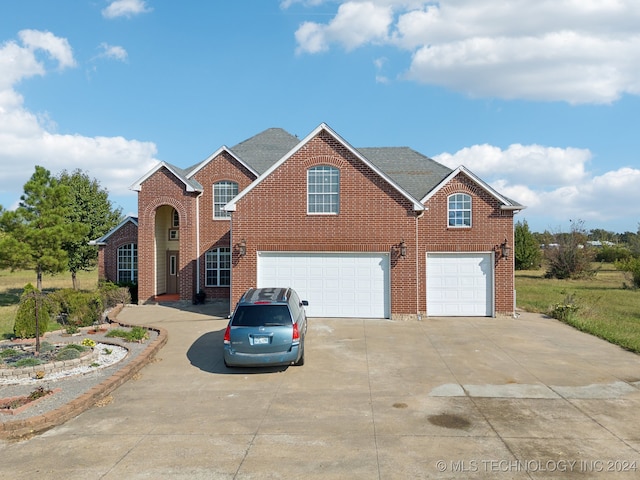 front of property with a garage