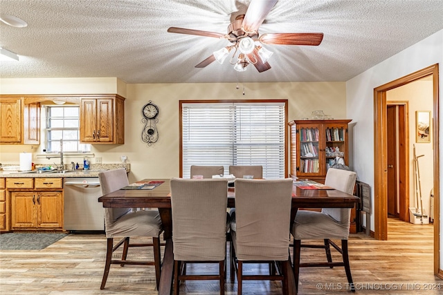 20515 S 4450, Vinita, OK 74301 - dining space with a textured ceiling, a ceiling fan, and light wood-style flooring