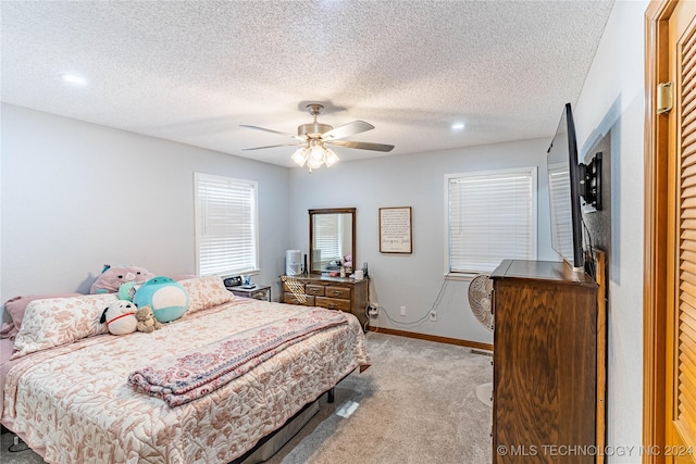 20515 S 4450, Vinita, OK 74301 - bedroom with light colored carpet, a textured ceiling, baseboards, and a ceiling fan