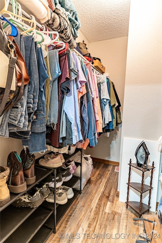 20515 S 4450, Vinita, OK 74301 - walk in closet with wood finished floors