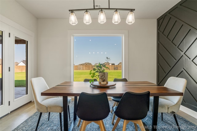 dining room featuring light hardwood / wood-style flooring