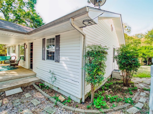 view of home's exterior with covered porch