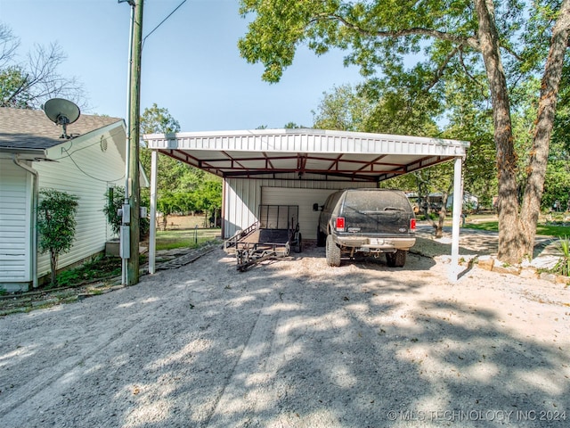 view of vehicle parking featuring a carport