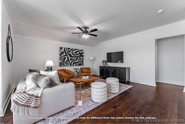 living room with a ceiling fan, baseboards, dark wood-style floors, and ornamental molding