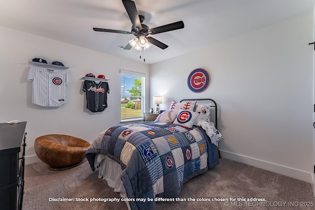 bedroom featuring dark carpet, baseboards, and ceiling fan