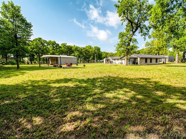 view of yard featuring a carport