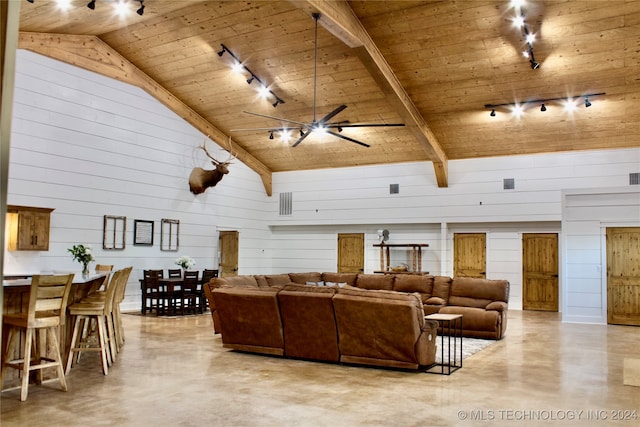 living room with high vaulted ceiling, track lighting, wooden ceiling, and ceiling fan