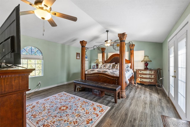 bedroom with dark hardwood / wood-style flooring, french doors, vaulted ceiling, and ceiling fan