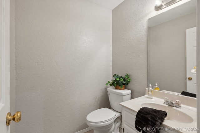 bathroom with sink and toilet