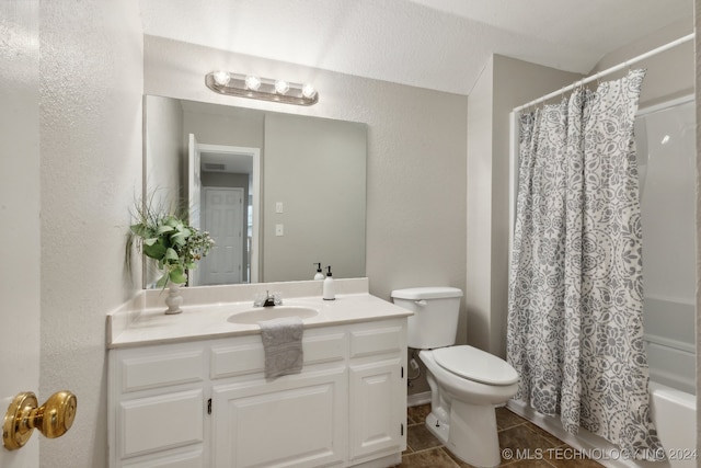 full bathroom with vanity, tile patterned flooring, toilet, a textured ceiling, and shower / tub combo