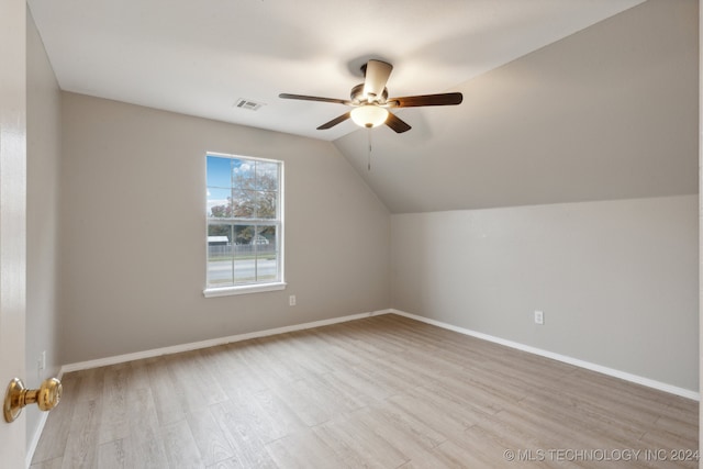 bonus room with ceiling fan, light hardwood / wood-style floors, and lofted ceiling