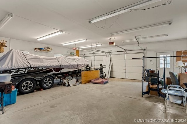 garage featuring a garage door opener