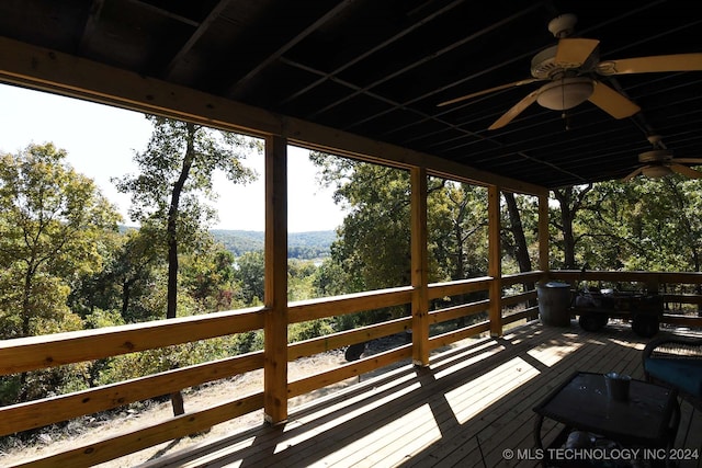 wooden deck with ceiling fan