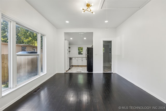 empty room featuring hardwood / wood-style flooring