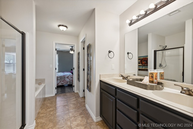 bathroom featuring vanity, shower with separate bathtub, ceiling fan, and tile patterned floors