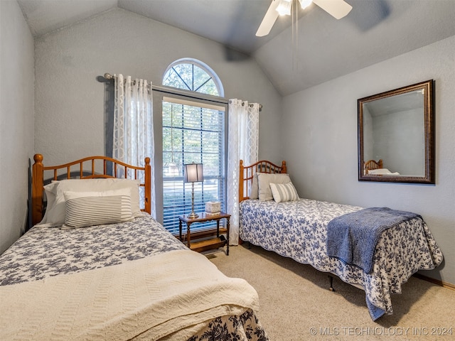 carpeted bedroom with ceiling fan and lofted ceiling