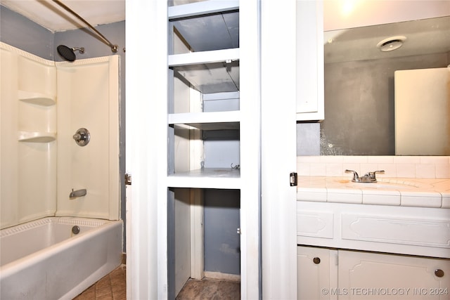 bathroom featuring vanity and shower / washtub combination