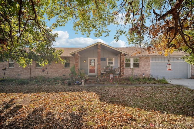 single story home with a garage