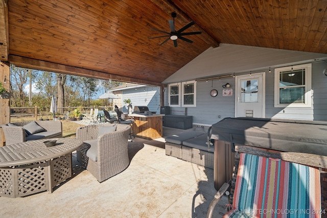 view of patio featuring outdoor lounge area, an outdoor kitchen, area for grilling, and ceiling fan