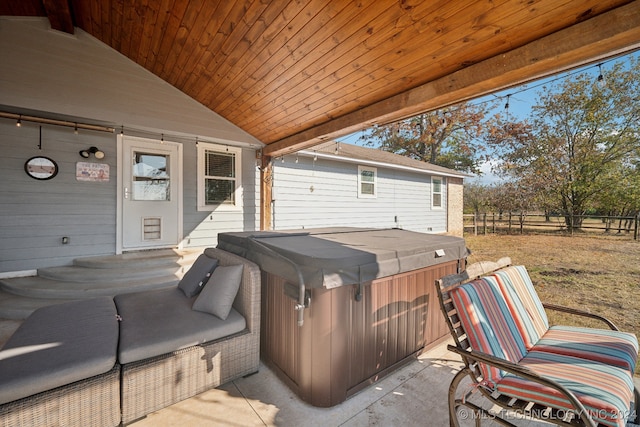 view of patio with a hot tub