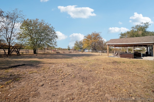 view of yard with a gazebo and a rural view