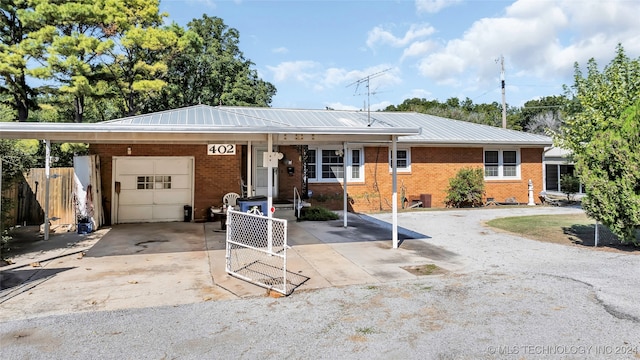 ranch-style home featuring a carport