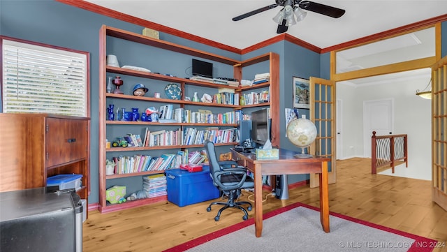 office space featuring ornamental molding, ceiling fan, and wood-type flooring