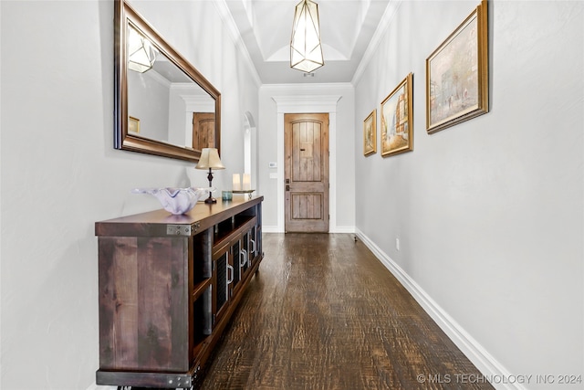 corridor with crown molding and dark hardwood / wood-style floors