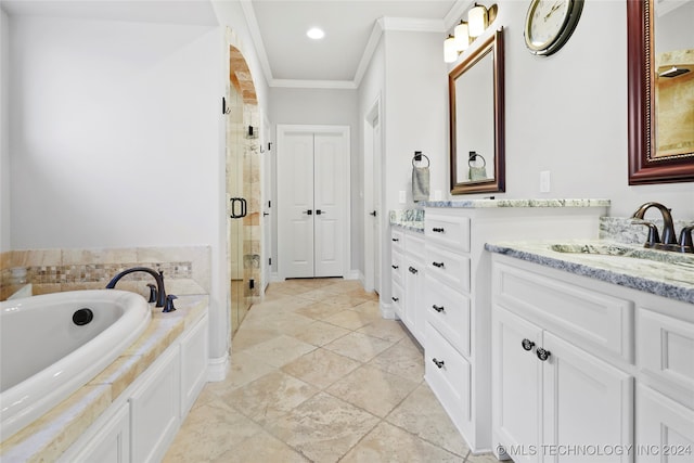 bathroom featuring vanity, crown molding, and shower with separate bathtub