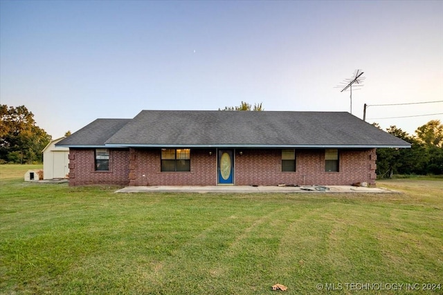 711 E Iowa, Whitefield, OK 74472 - view of front of home featuring a front yard and brick siding