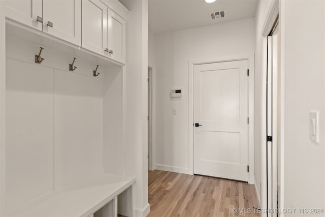 mudroom with light wood-type flooring