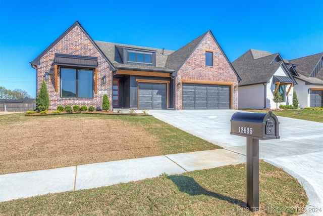 view of front of property featuring a garage, brick siding, concrete driveway, roof with shingles, and a front lawn