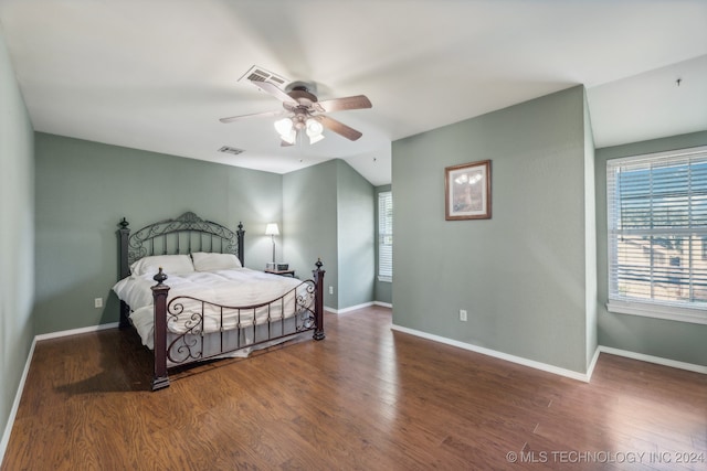 bedroom featuring dark hardwood / wood-style flooring and ceiling fan