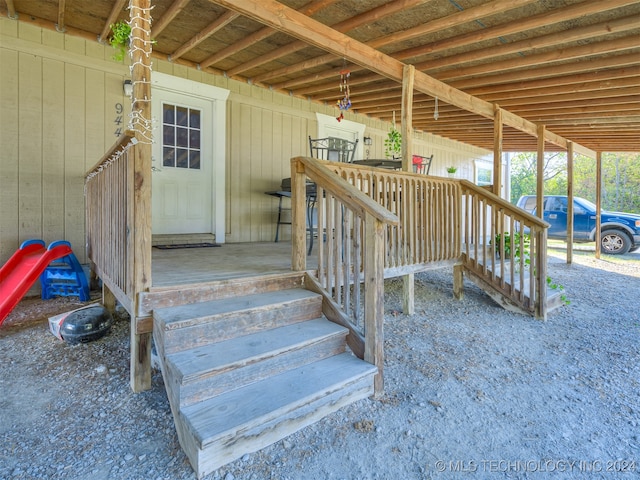 entrance to property featuring a carport